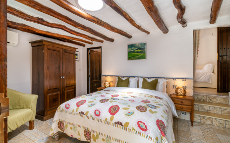 Bedroom 1 (Almond) with steps to adjoining single room